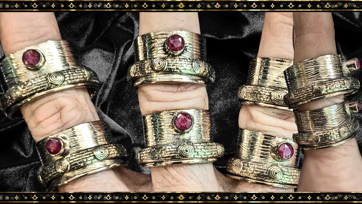 Sterling Silver Ruby Spinner Rings Offerings